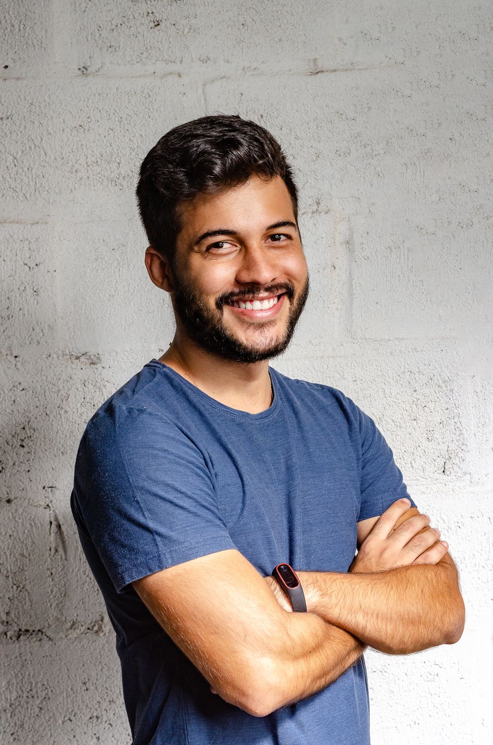 man with low fade haircut and full beard