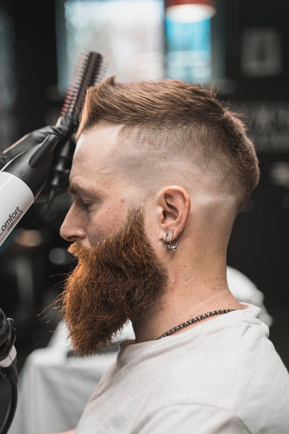 bearded man with drop fade and textured short top