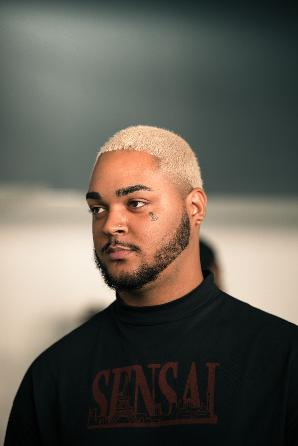 man with blonde cropped hair and short beard