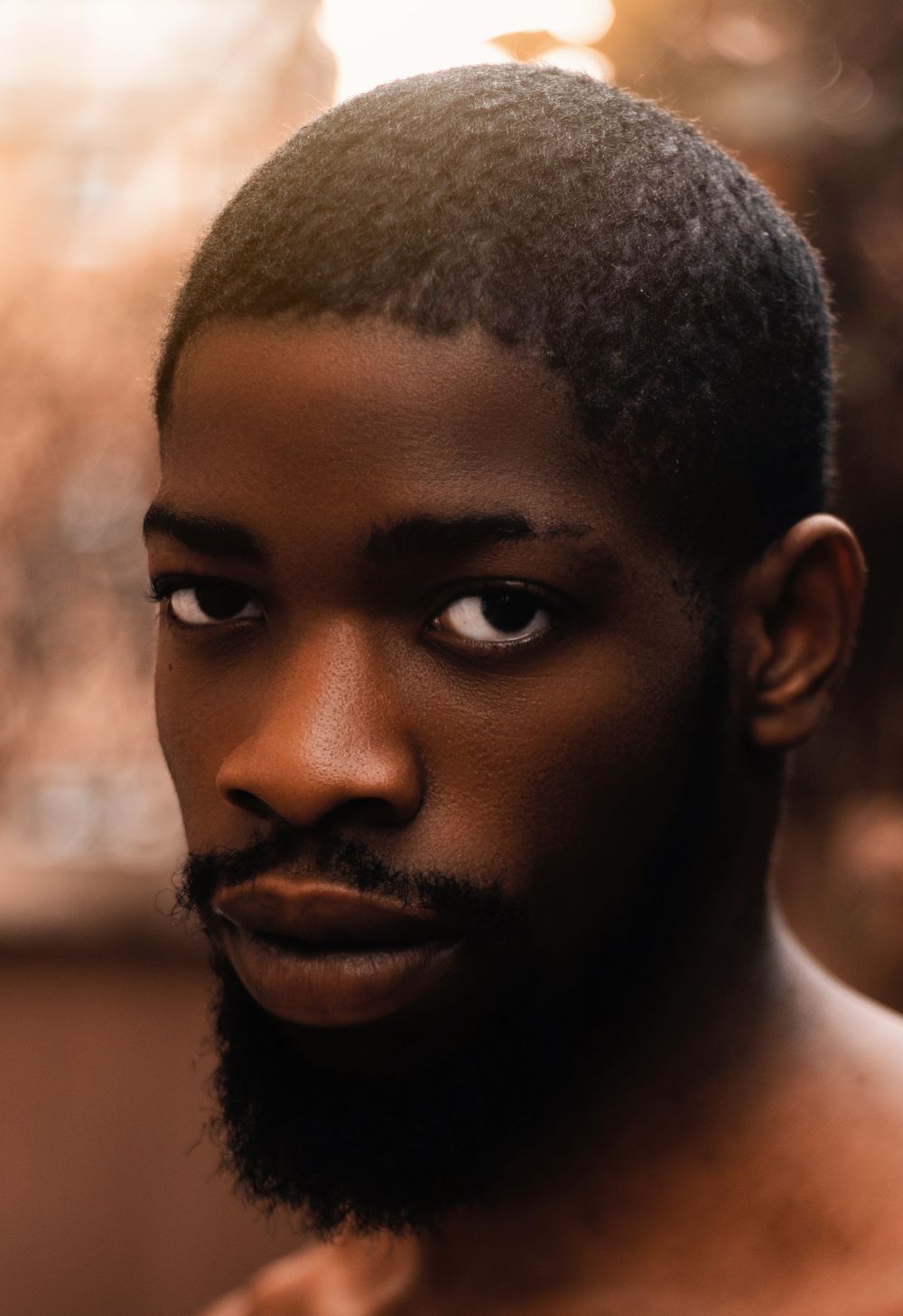 man with a close buzz cut and full beard
