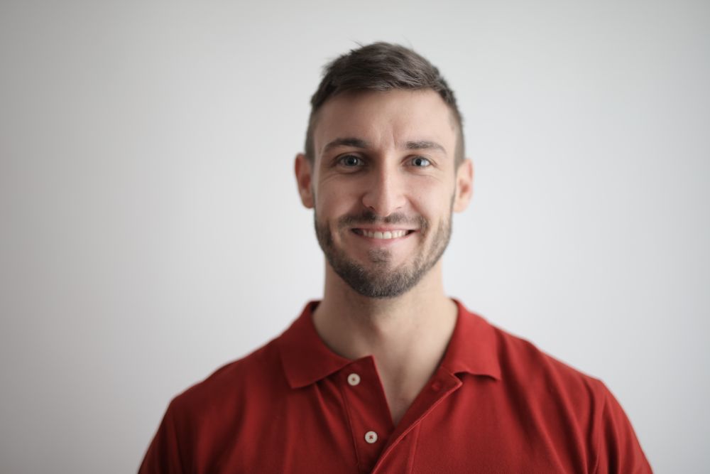 man with buzz cut and beard