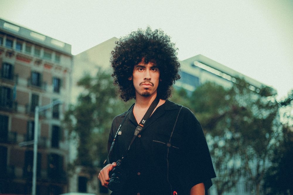 man with casual medium afro hairstyle