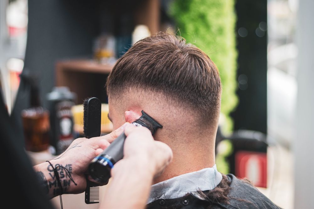 back view of classic low fade haircut and clean neckline