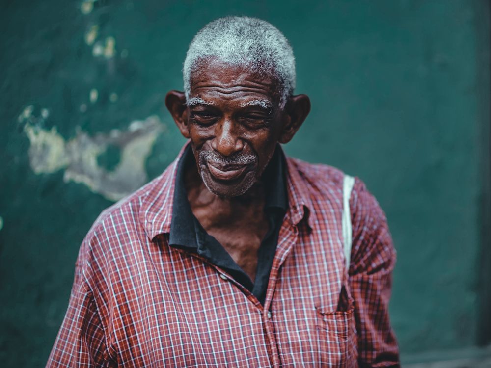 elderly man with gray textured medium hair