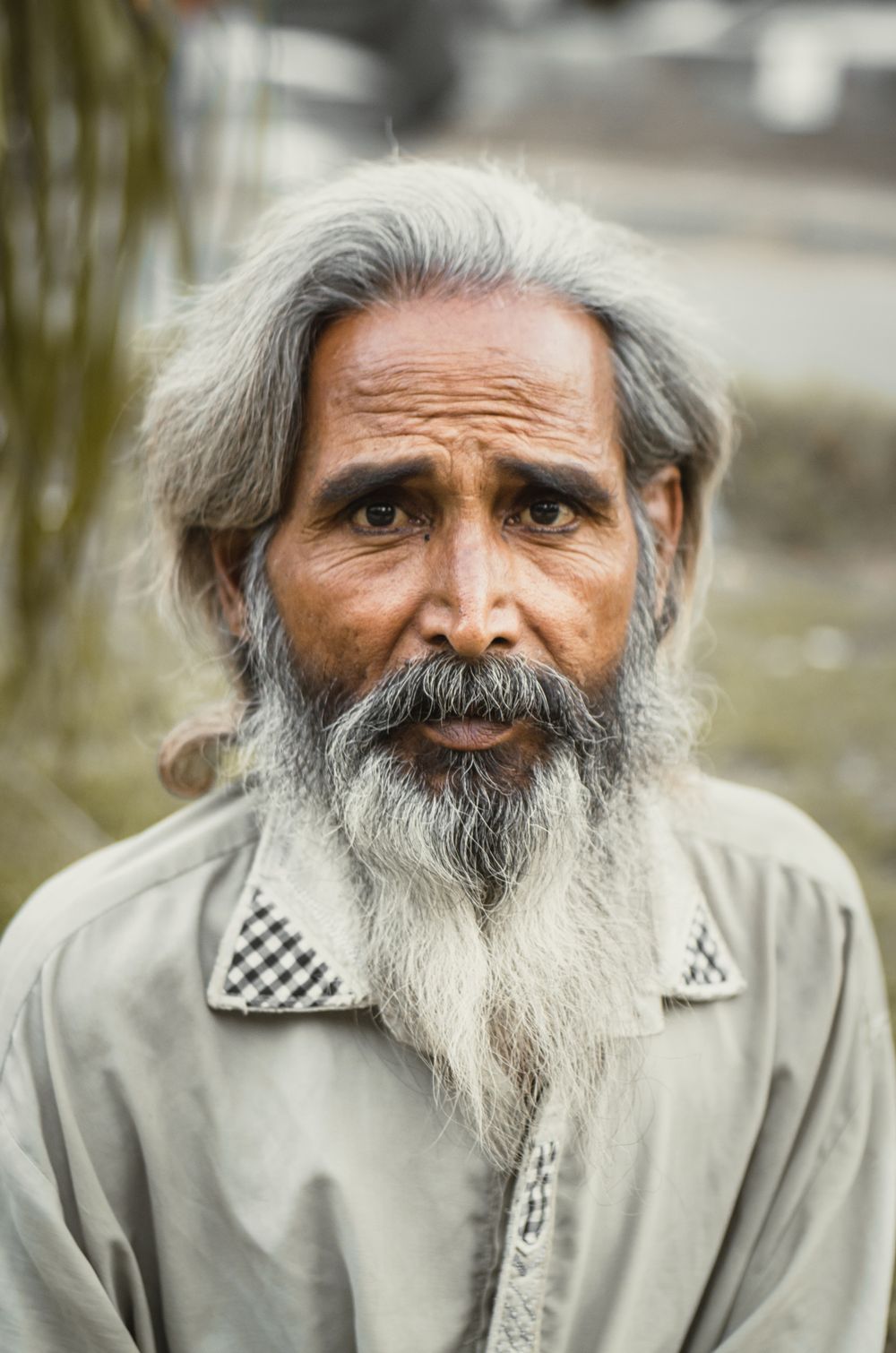 older man with long gray hair and long beard