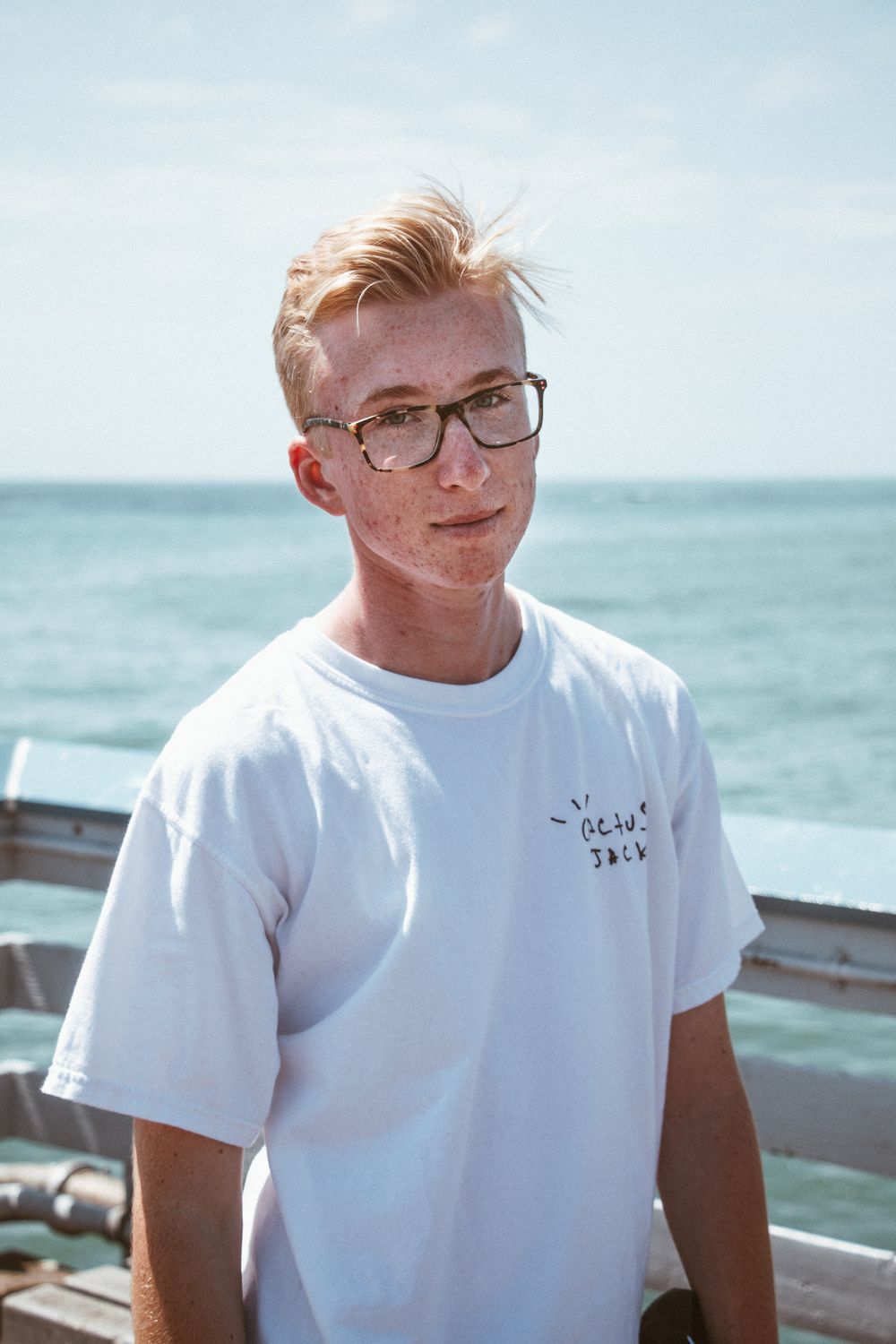 man with longer top hairstyle and tapered sides