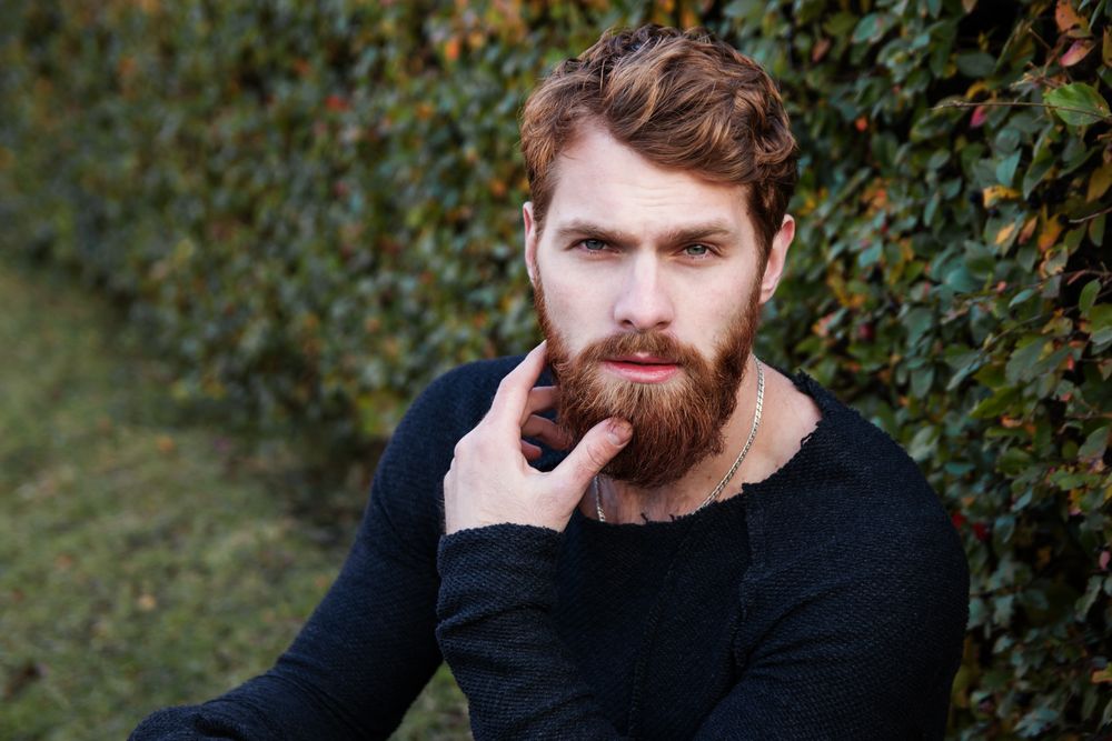 man with low fade and cropped top