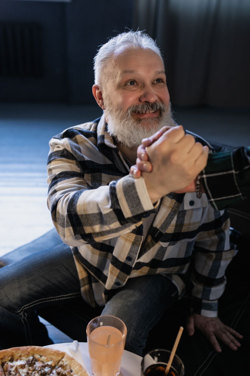 mature man with short gray hair and a natural receding hairline