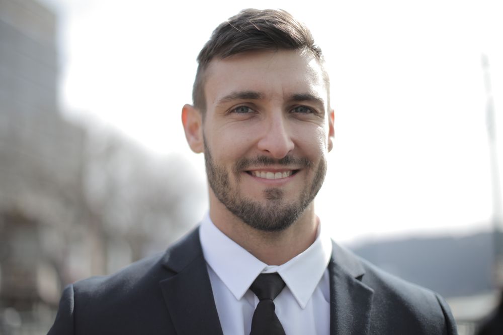 mature man with salt and pepper crop haircut