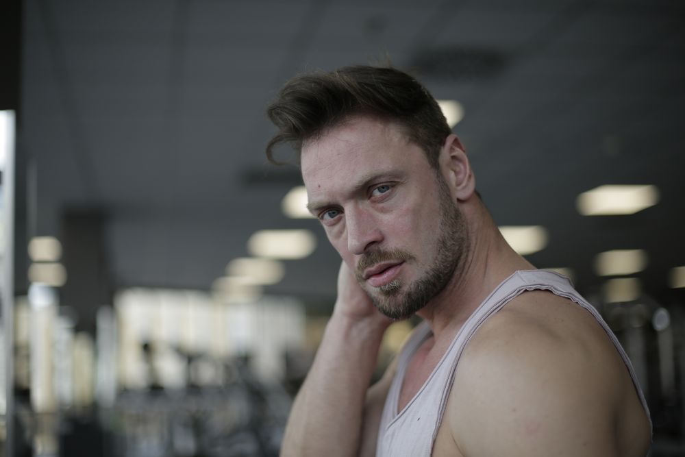 man with short quiff hairstyle and receding temples